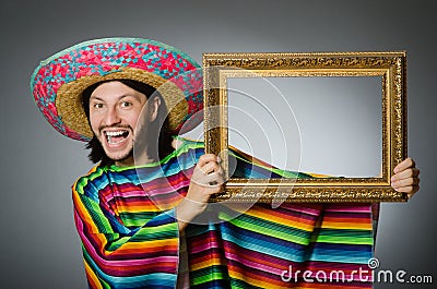 The mexican man with sombrero and picture frame Stock Photo