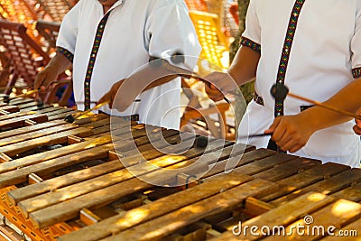 Mexican musicians playing a wooden marimba Stock Photo