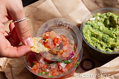 Mexican nacho chips salsa and guacamole Stock Photo