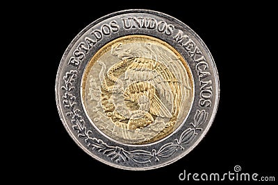 Mexican one peso coin close up on black Stock Photo