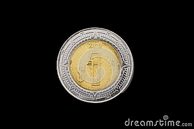 Mexican One Peso Coin Isolated On A Black Background Stock Photo