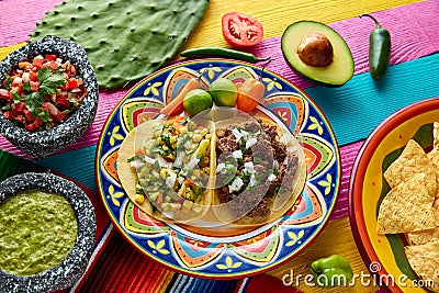 Mexican platillo tacos barbacoa and vegetarian Stock Photo