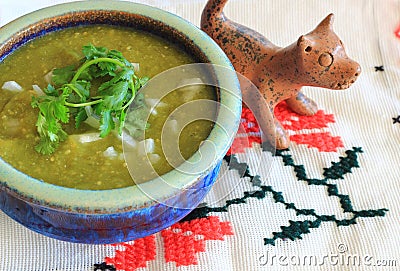 Mexican Salsa Verde and clay Xoloitzcuintle dog Stock Photo