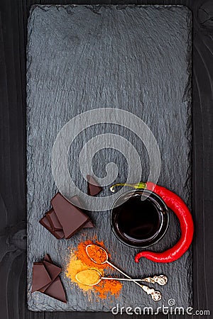 Mexican spicy hot chocolate with chili pepper and cinnamon. Top view frome above, copy space Stock Photo