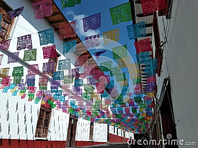 Mexican street colorful flag Day of Dead Editorial Stock Photo