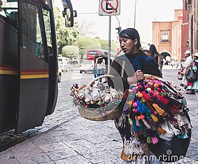 Mexican woman selling handcrafts Editorial Stock Photo