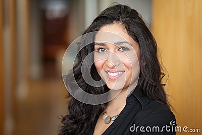 Mexican woman smiling at home. She is really happy. Stock Photo