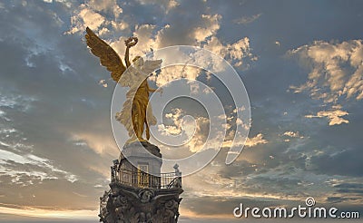 A view of the Angel of Independence, a triumphant column situated at a roundabout along the Editorial Stock Photo