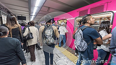 MEXICO - OCTOBER 26, 2017: Mexico City Underground Train Station with Local People Traveling. Tube, Train. Pushing Each Other Editorial Stock Photo