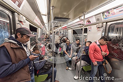 MEXICO - OCTOBER 26, 2017: Mexico City Underground Train with Local People Traveling. Tube, Train Editorial Stock Photo