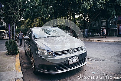 MEXICO - SEPTEMBER 19: Car with broken windshield due to fallen debris because of the earthquake Editorial Stock Photo