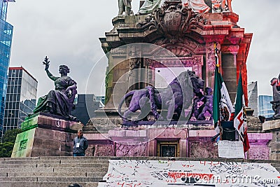 MEXICO - SEPTEMBER 20: Detail of the lion and and lady monuments at the feet of the Independence Angel at paseo Reforma Editorial Stock Photo