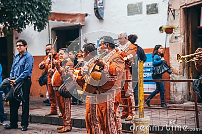 MEXICO - SEPTEMBER 23: Mariachi band performing on the street, S Editorial Stock Photo