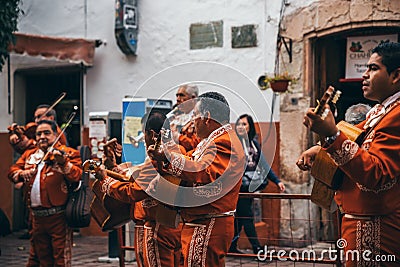 MEXICO - SEPTEMBER 23: Mariachi band performing on the street, S Editorial Stock Photo