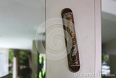 Mezuzah. Jewish religion and traditions of the Jews: Religious attribute at the entrance to a house. Large Decorative Mezuzah Stock Photo