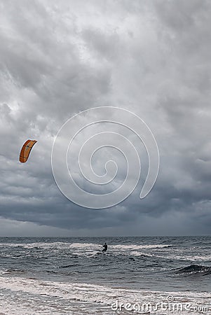 MiÄ™dzyzdroje, Poland - June 2018: Kitesurfing in stormy seas Editorial Stock Photo