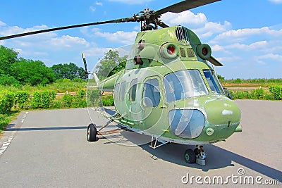 Mi-2 Hoplite. Helicopter standing on the site on a sunny summer day Editorial Stock Photo