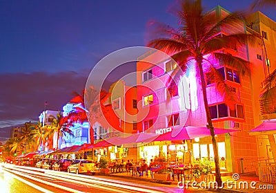 Miami Beach, Florida Moving traffic hotels and restaurants at sunset on Ocean Drive Stock Photo