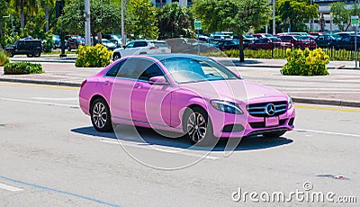 Miami Beach, Florida USA - April 15, 2021: pink mercedes benz c63 amg, corner view Editorial Stock Photo