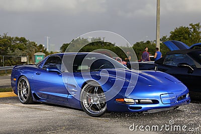 Blue Chevy Corvette in a parking lot Editorial Stock Photo