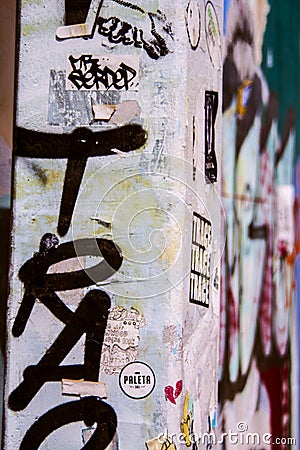 Concrete Post with Graffiti Art Tags Editorial Stock Photo