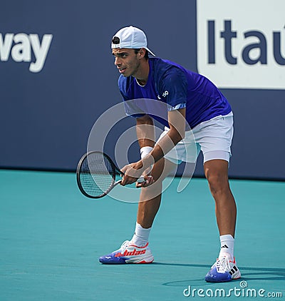 Francisco Cerundolo of Argentina in action during quarter-final match against Karen Khachanov of Russia at 2023 Miami Open Editorial Stock Photo