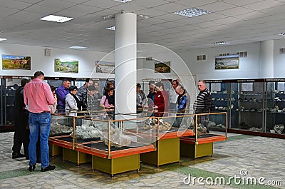 Miass, Chelyabinsk region, Russia, November, 14, 2018. People on the excursion in the hall of the Museum of the Ilmensky reserve Editorial Stock Photo