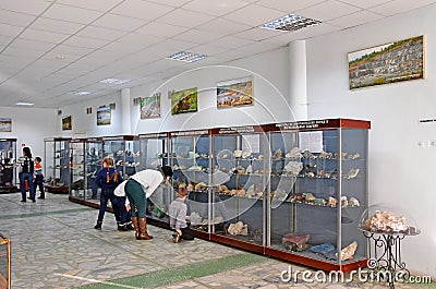 Miass, Chelyabinsk region, Russia, November, 14, 2018. People on the excursion in the hall of the Museum of the Ilmensky reserve Editorial Stock Photo