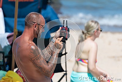 Non-Commercial Pilot flying Drone at an Event Editorial Stock Photo