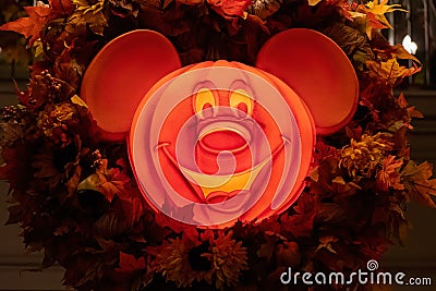 Mickey Mouse halloween jack 0 lantern lit at night Editorial Stock Photo