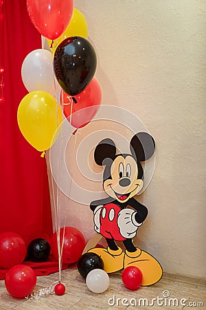 Mickey Mouse party. Character of Walt Disney cartoon with colorful balloons Editorial Stock Photo