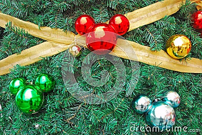 Mickey mouse shaped ornaments as Christmas Tree Decoration with gold golden ribbon Stock Photo