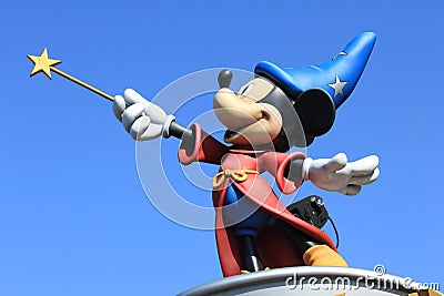 A statue of Mickey Mouse in Disneyland Paris in France on the blue sky background Editorial Stock Photo