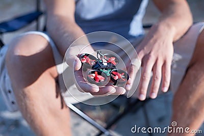 Micro drone in hand Stock Photo