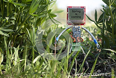 Micro robot in spring nature Stock Photo