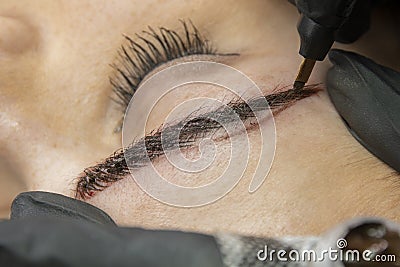 Microblading with ink needle Stock Photo