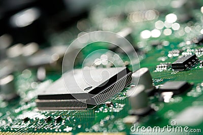 Microchip on green circuit board Stock Photo