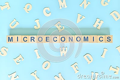 Microeconomics concept in finance and economics. Word typography Stock Photo