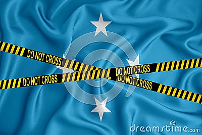 Micronesia flag, the Don`t Cross the Line mark and the location tape. Crime concept, police investigation, quarantine. 3d Stock Photo