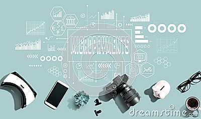 Micropayments theme with electronic gadgets and office supplies Stock Photo