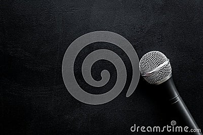 Microphone for blogger, journalist or musician work on black background top view mock-up Stock Photo