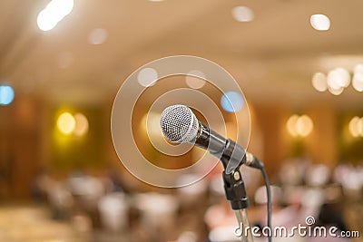 microphone in concert hall or conference room with lights in background. with extremely shallow dof Stock Photo