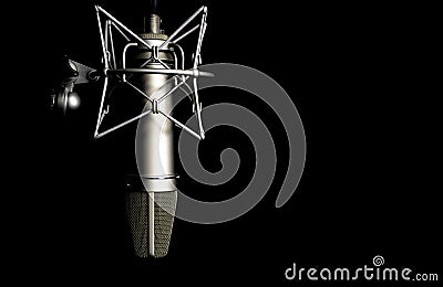 Microphone detail in music and sound recording studio, black background, closeup Stock Photo