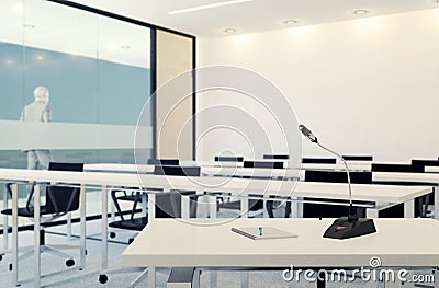 Microphone in empty meeting room or conference room, Bussiness concept, selective focus on microphone Stock Photo