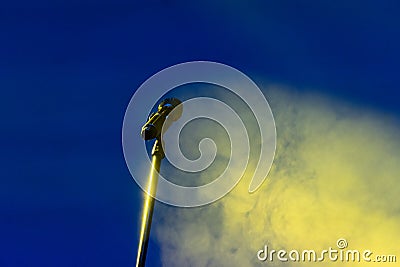 Microphone in nighttime outdoor concert, artificial lighting in Central America, Guatemala. Stock Photo