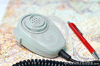 Microphone and pen on aeronautical chart Stock Photo