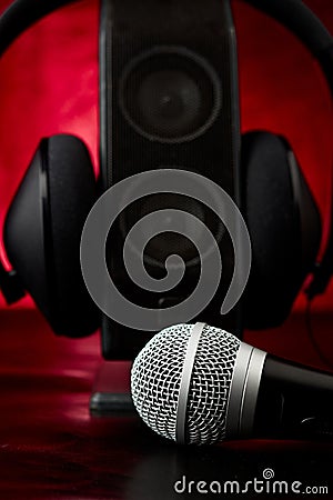 Microphone sharing with speaker and headphones Stock Photo