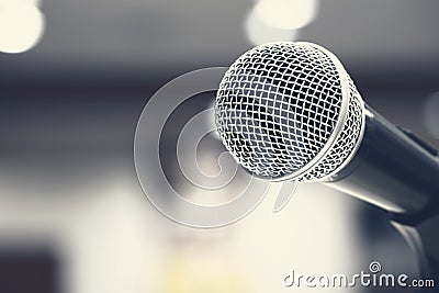 Microphones singing on stage in black colour Stock Photo