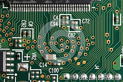 Microprocessor printed circuit board with electronic components and conductive paths Stock Photo