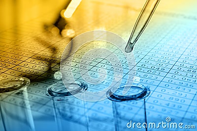 Microscope with biological material and test tubes Stock Photo